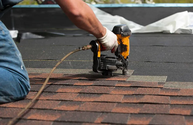 nail-gun-asphalt Asphalt Roof Repair